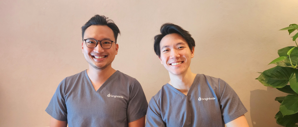 Two dentists from Brightside Dental grinning